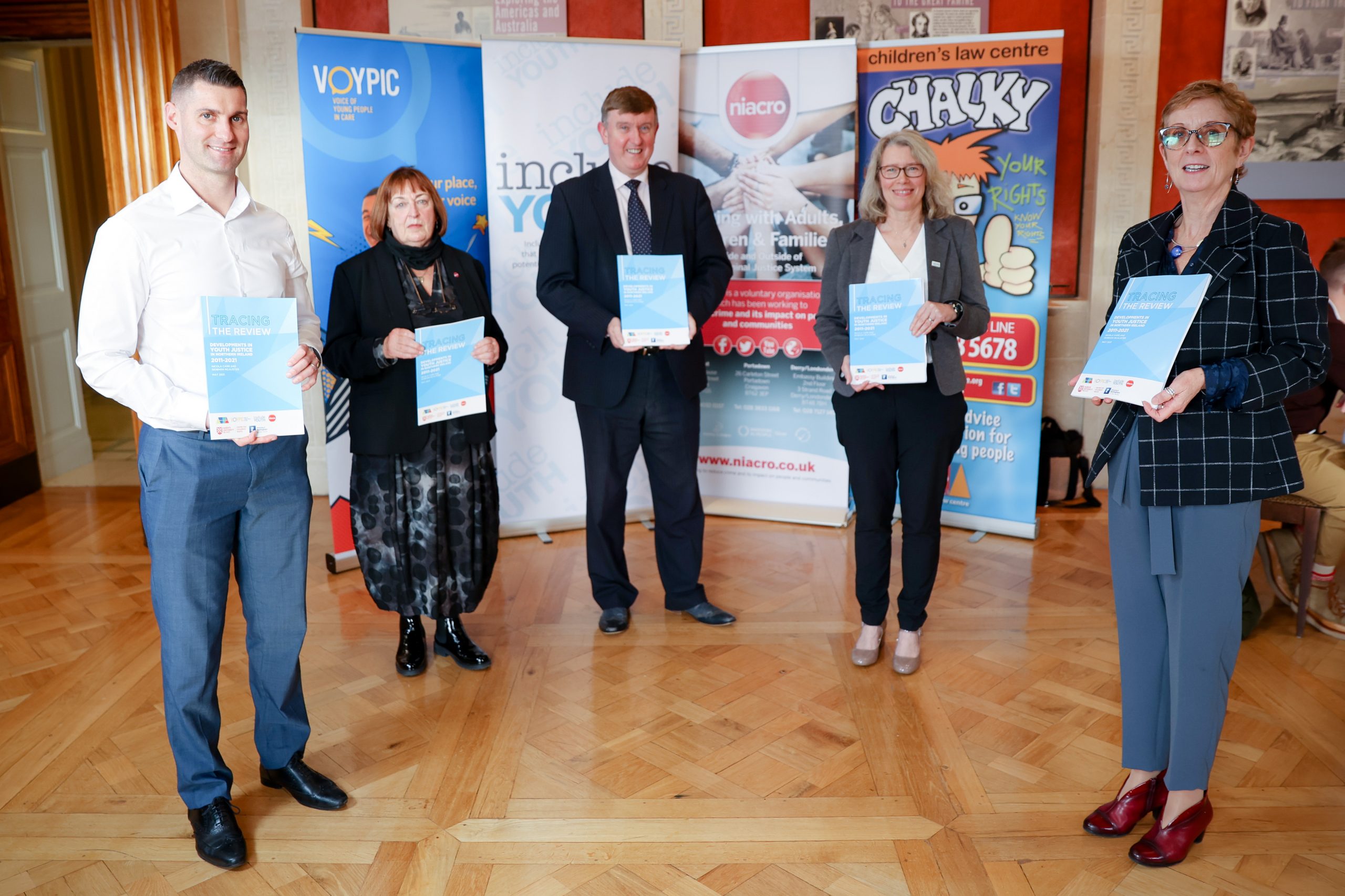 Chair of the Justice Committee, Mervyn Storey MLA, joins Paul McCafferty (VOYPIC), Olwen Lyner (NIACRO), Paula Rodgers (Include Youth) and Paddy Kelly (Children's Law Centre) at the launch of 'Tracing the Review'.